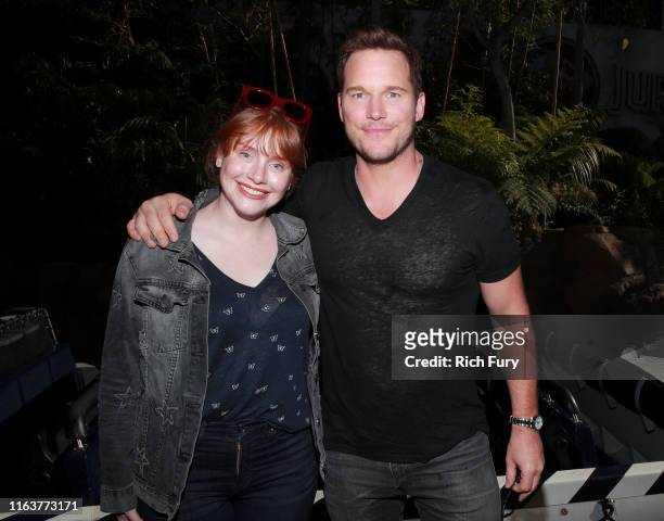 Bryce Dallas Howard and Chris Pratt attend the grand opening celebration of 'Jurassic World -The Ride' at Universal Studios Hollywood on July 22,...