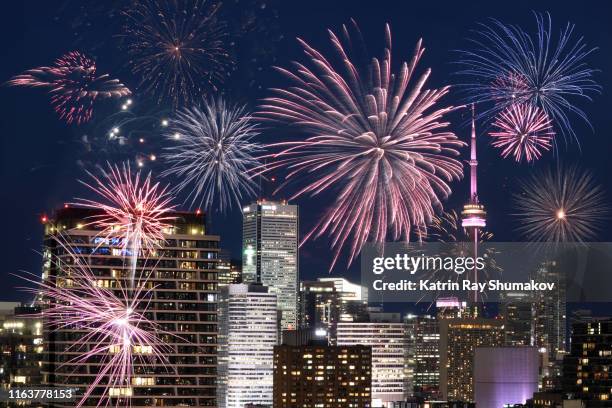 dazzling fireworks in toronto - canada day stock pictures, royalty-free photos & images