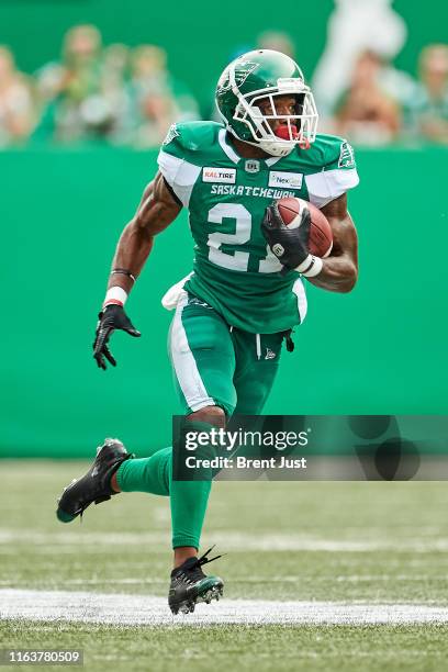 McCray of the Saskatchewan Roughriders runs with the ball after making an interception in the game between the Ottawa RedBlacks and Saskatchewan...