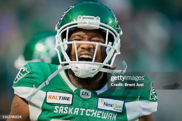 Loucheiz Purifoy of the Saskatchewan Roughriders celebrates after recovering a fumble late in the game between the Ottawa RedBlacks and Saskatchewan...