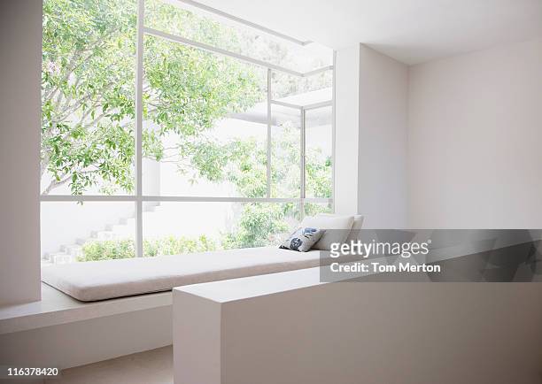 window seat - bay window interior stock pictures, royalty-free photos & images