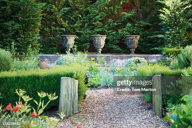 path in garden - formal garden gate stock pictures, royalty-free photos & images