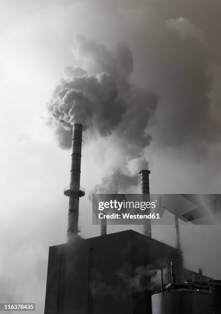 austria, vocklabruck, lenzing, smoke emitting out of factory - upper austria stock pictures, royalty-free photos & images