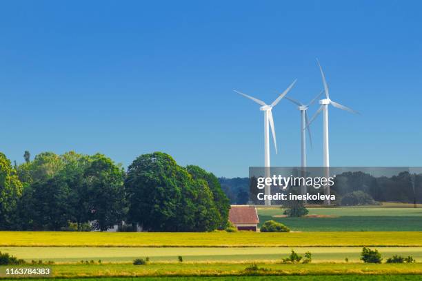 wind power generator - sweden house stock pictures, royalty-free photos & images