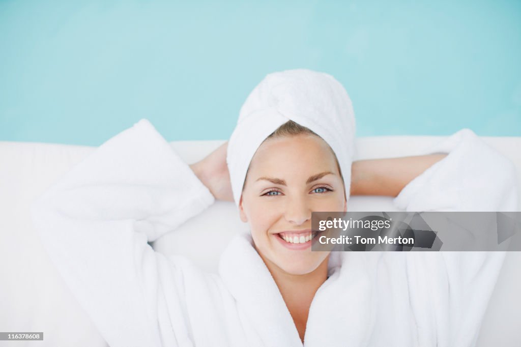 Woman laying poolside