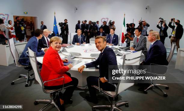 Canada's Prime Minister Justin Trudeau, Britain's Prime Minister Boris Johnson, Germany's Chancellor Angela Merkel, European Council President Donald...