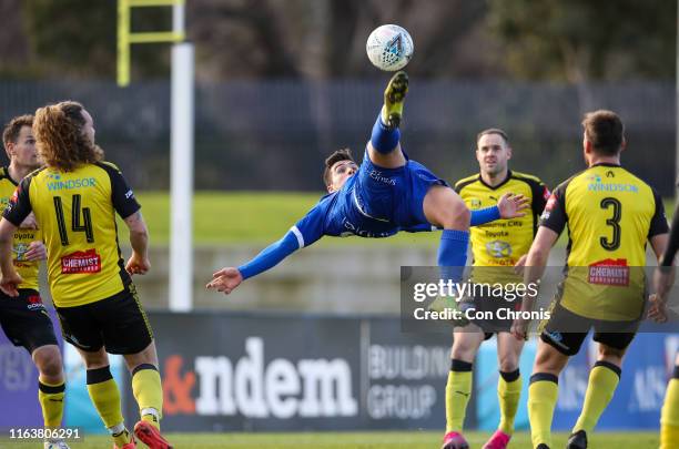 Peter Skapetis of South Melbourne kicks the ball towards the goals during the Victoria NPL match between Heidelberg United FC and South Melbourne FC...