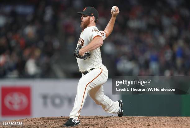 Sam Dyson of the San Francisco Giants pitches against the Chicago Cubs in the top of the ninth inning at Oracle Park on July 22, 2019 in San...