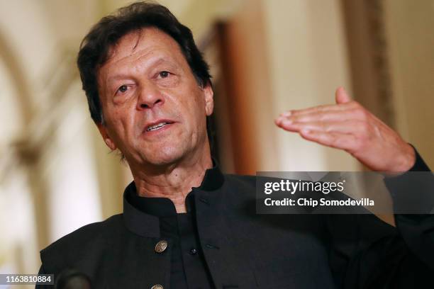 Pakistan Prime Minister Imran Khan makes a brief statement to reporters before a meeting with U.S. House Speaker Nancy Pelosi at the U.S. Capitol...