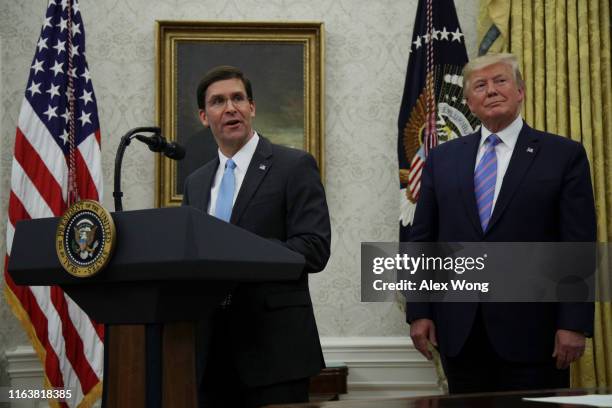 Mark Esper speaks during his swearing in ceremony to be the new U.S. Secretary of Defense as U.S. President Donald Trump looks on July 23, 2019 in...