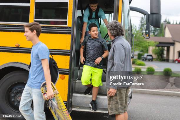 Getting Off 90 Teenager Getting Off Bus Stock Photos, High-Res Pictures, and Images ...