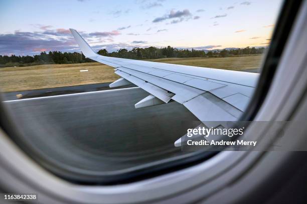 aeroplane, airliner speeding on runway at takeoff - airplane runway stockfoto's en -beelden