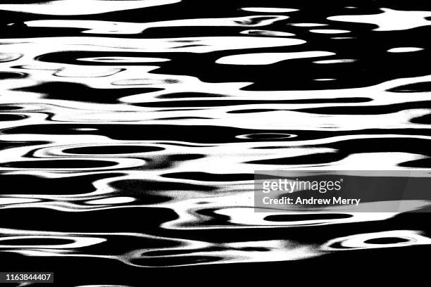 water ripple wave patterns with reflections - water ripple stockfoto's en -beelden