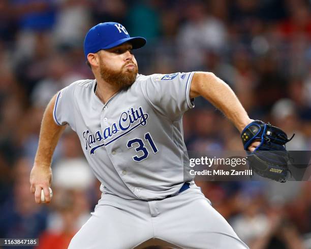 Pitcher Ian Kennedy of the Kansas City Royals throws a pitch in the ninth inning during the game against the Atlanta Braves at SunTrust Park on July...