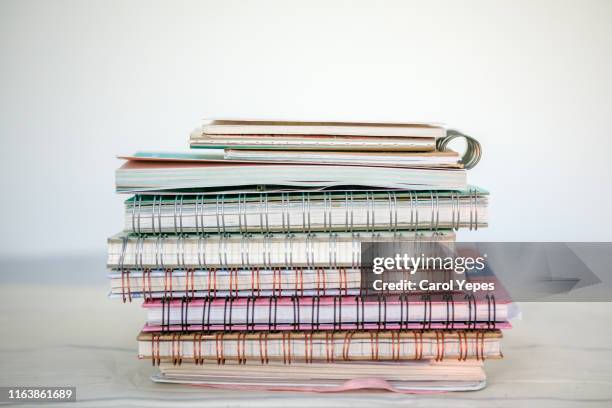 stack of ringbinders notebook - manuale foto e immagini stock