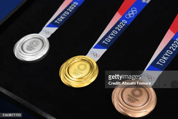The silver, gold and bronze medals are displayed after the Tokyo 2020 medal design unveiling ceremony during Tokyo 2020 Olympic Games "One Year To...