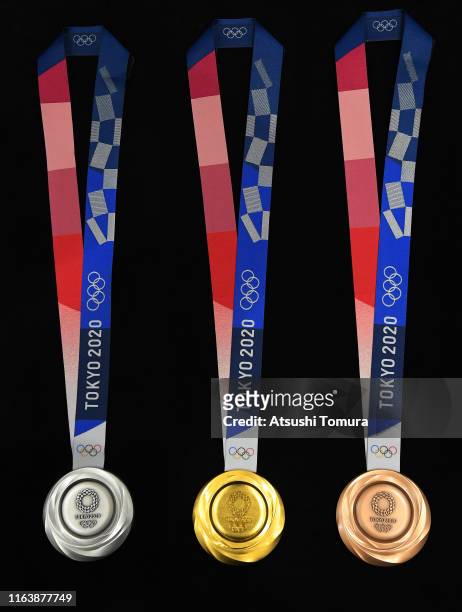 The silver, gold and bronze medals are displayed after the Tokyo 2020 medal design unveiling ceremony during Tokyo 2020 Olympic Games "One Year To...