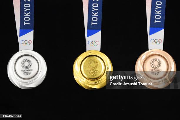 The silver, gold and bronze medals are displayed after the Tokyo 2020 medal design unveiling ceremony during Tokyo 2020 Olympic Games "One Year To...