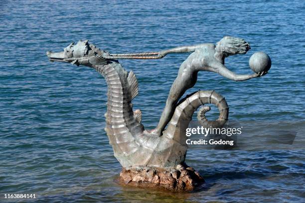 Nymph on sea horse in the Lake Geneva. Vevey. Switzerland.