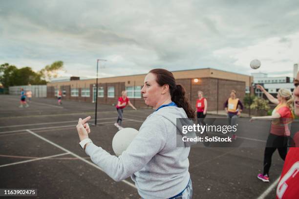 managing the netball game - referee uniform stock pictures, royalty-free photos & images