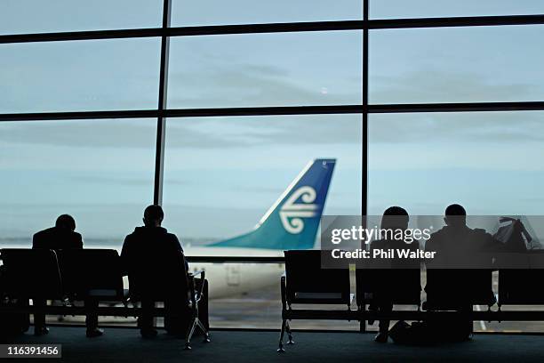 Passengers wait to board flights in the Air NZ terminal at the Auckland Domestic Airport on June 16, 2011 in Auckland, New Zealand. Air New Zealand...