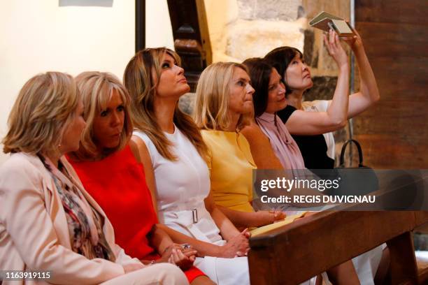 Chile's First Lady Cecilia Morel, French President's wife Brigitte Macron, US First Lady Melania Trump, European Council President's wife Malgorzata...