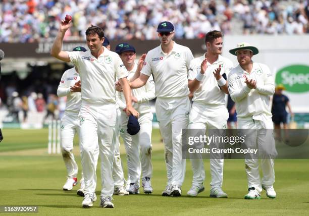 Tim Murtagh of Ireland salutes the crowd as he leaves the field after taking five wickets during day one of the Specsavers Test Match between England...