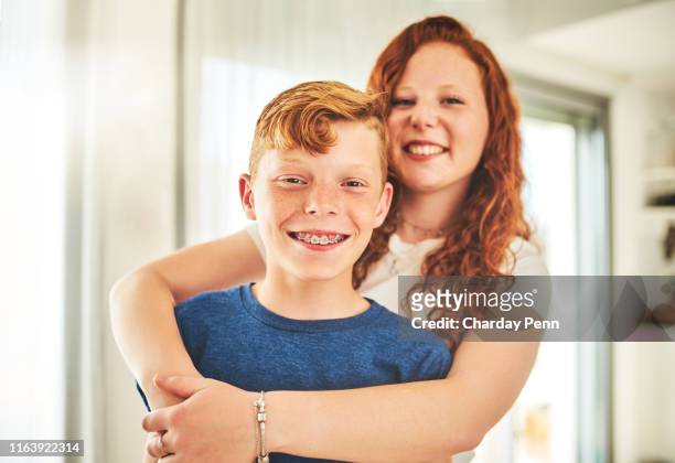 i am my brother's keeper - redhead boy stock pictures, royalty-free photos & images