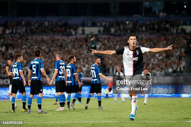 Cristiano Ronaldo of Juventus celebrates scoring his side's first goal from a free kick during the International Champions Cup match between Juventus...
