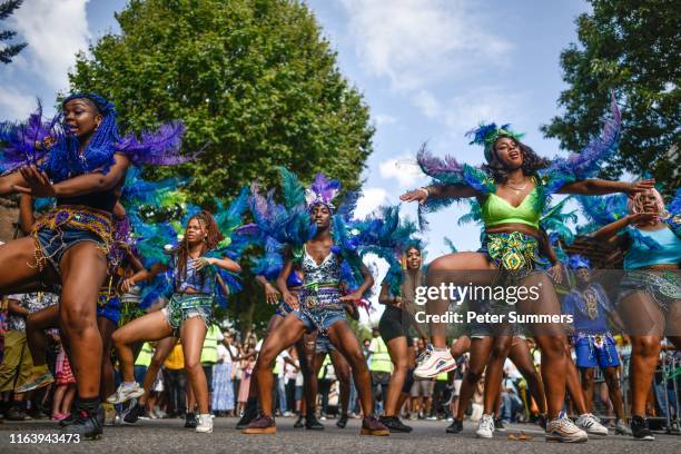 Revellers and paraders attend the Notting Hill carnival on August 25, 2019 in London, England. One million people are expected on the streets in...