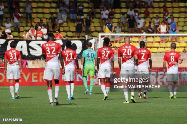 Monaco players react at the end of the French L1 football match Monaco vs Nimes on August 25, 2019 at the "Louis II Stadium" in Monaco.