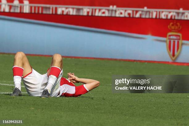 Monaco's Russian midfielder Aleksandr Golovin reacts at the end of the French L1 football match Monaco vs Nimes on August 25, 2019 at the "Louis II...