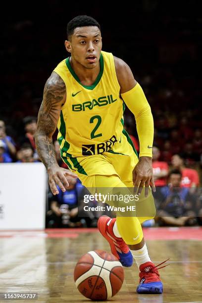 Yago Mateus Dos Santos of Brazil National Team drives against China National Team during 2019 Sion BRAZIL Men's International Basketball Challenge at...