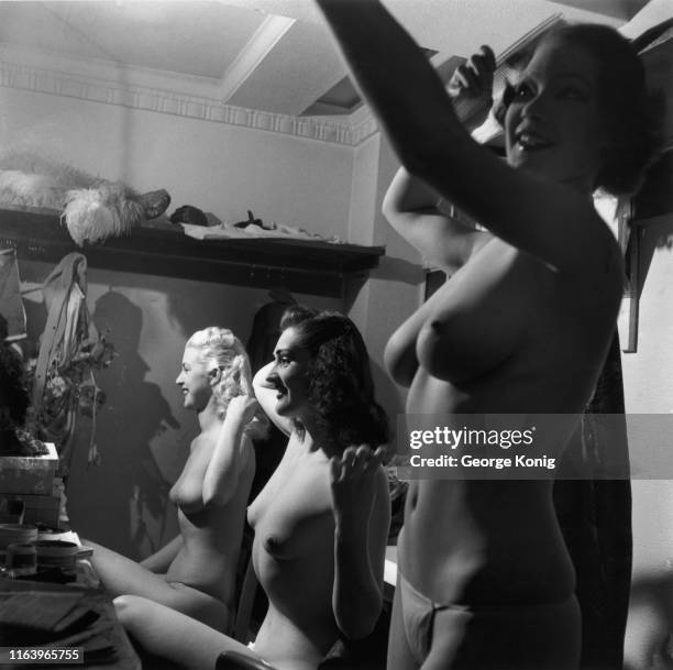 Showgirls in a dressing room backstage at the London Casino theatre in Soho during a performance of 'Latin Quarter 1950', London, April 1950. The...