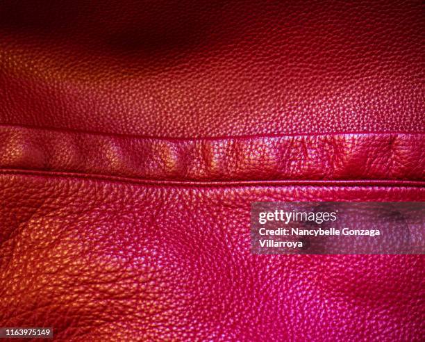 details of a red leather purse. - vintage handbag stock pictures, royalty-free photos & images