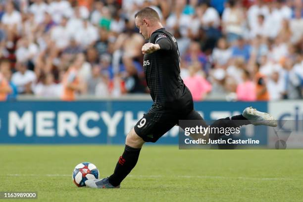 Wayne Rooney of the D.C. United takes a shot in the game against the FC Cincinnati at Nippert Stadium on July 18, 2019 in Cincinnati, Ohio.