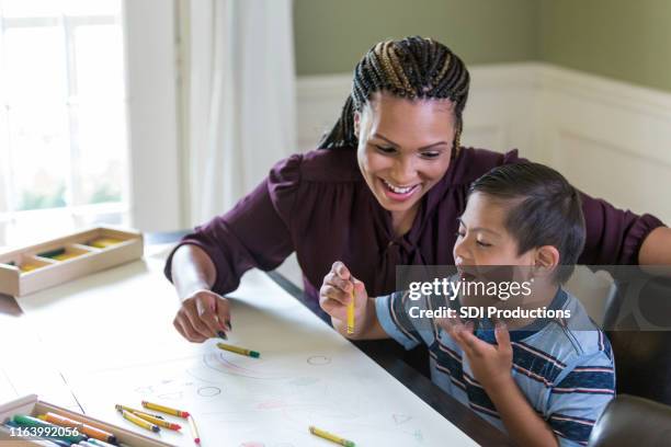 excited special needs boy - mental disability stock pictures, royalty-free photos & images