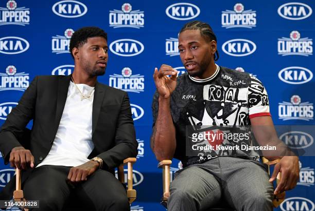 Paul George and Kawhi Leonard of the Los Angeles Clippers are introduced at Green Meadows Recreation Center on July 24, 2019 in Los Angeles,...