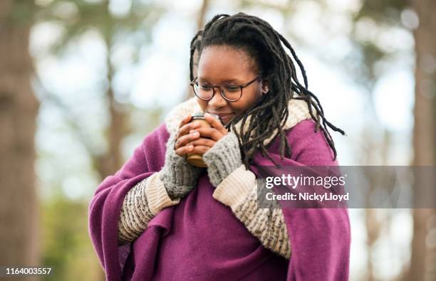 having coffee outdoors on an autumn day - sweater weather stock pictures, royalty-free photos & images