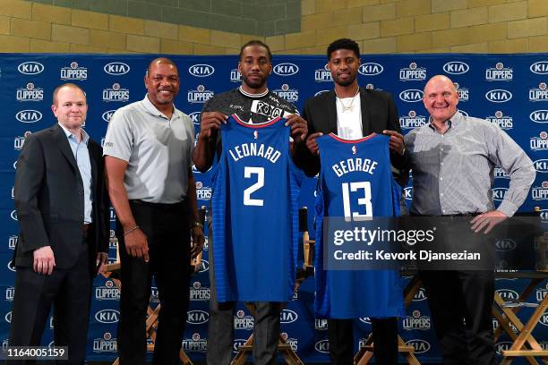 President of Basketball Operations Lawrence Frank, head coach Doc Rivers, Paul George, Kawhi Leonard and owner Steve Ballmer of the Los Angeles...