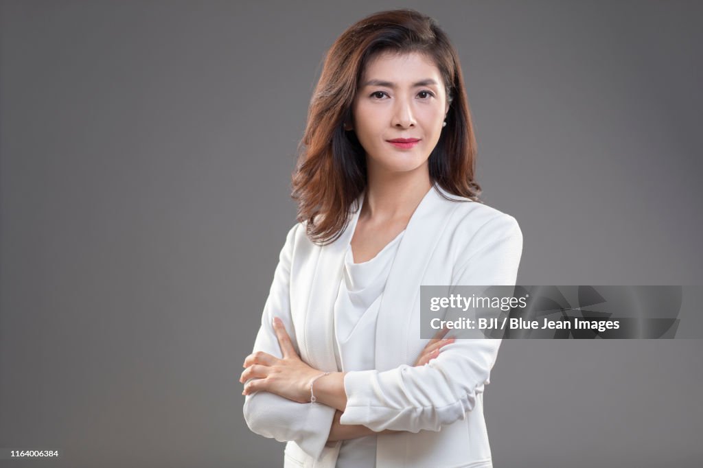 Portrait of middle-aged Chinese businesswoman