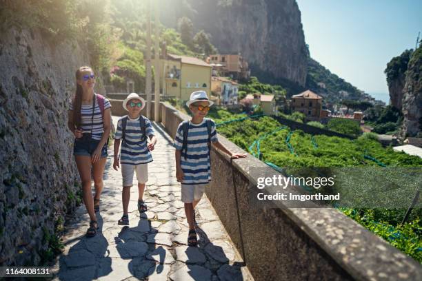 thee kids hiking from amalfi to mountains - amalfi hike stock pictures, royalty-free photos & images