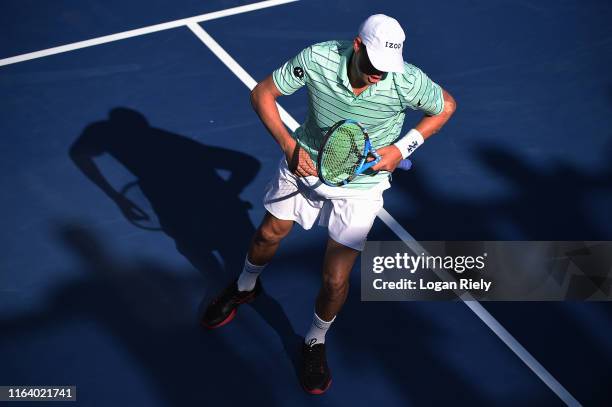 Bob Bryan runs to the bench after losing a game to Christopher Eubanks and Donald Young during the BB&T Atlanta Open at Atlantic Station on July 24,...