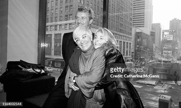 To R: Actors Rutger Hauer and Nastassja Kinski pose with director Lina Wertmuller at a press conference for Wertmullers' film "Crystal or Ash, Fire...
