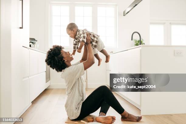 welcome to motherhood - mom exercising stock pictures, royalty-free photos & images