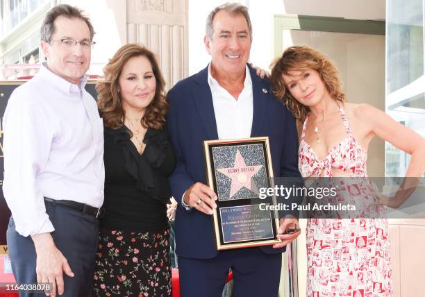 Gary Marsh, Kathy Najimy, Kenny Ortega and Jennifer Grey attend a ceremony to honor Kenny Ortega with a star on the Hollywood Walk Of Fame on July...