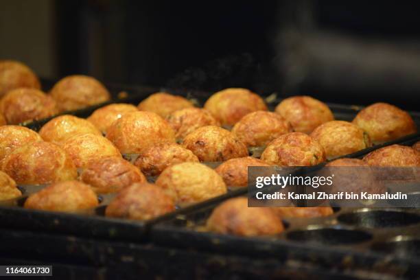 takoyaki street food at osaka - takoyaki stock pictures, royalty-free photos & images