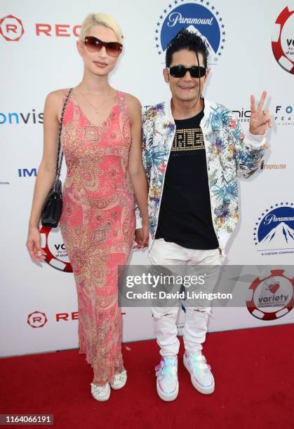 Courtney Anne Mitchell and Corey Feldman attend the 9th Annual Variety - The Children's Charity Poker and Casino Night at Paramount Studios on July...