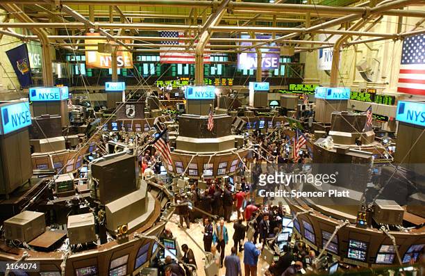 Traders work on floor of the New York Stock Exchange September 27, 2001 in New York City.