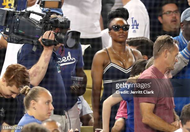 Former Olympian Carmelita Jeter attends The Los Angeles Dodgers Game at Dodger Stadium on July 24, 2019 in Los Angeles, California.